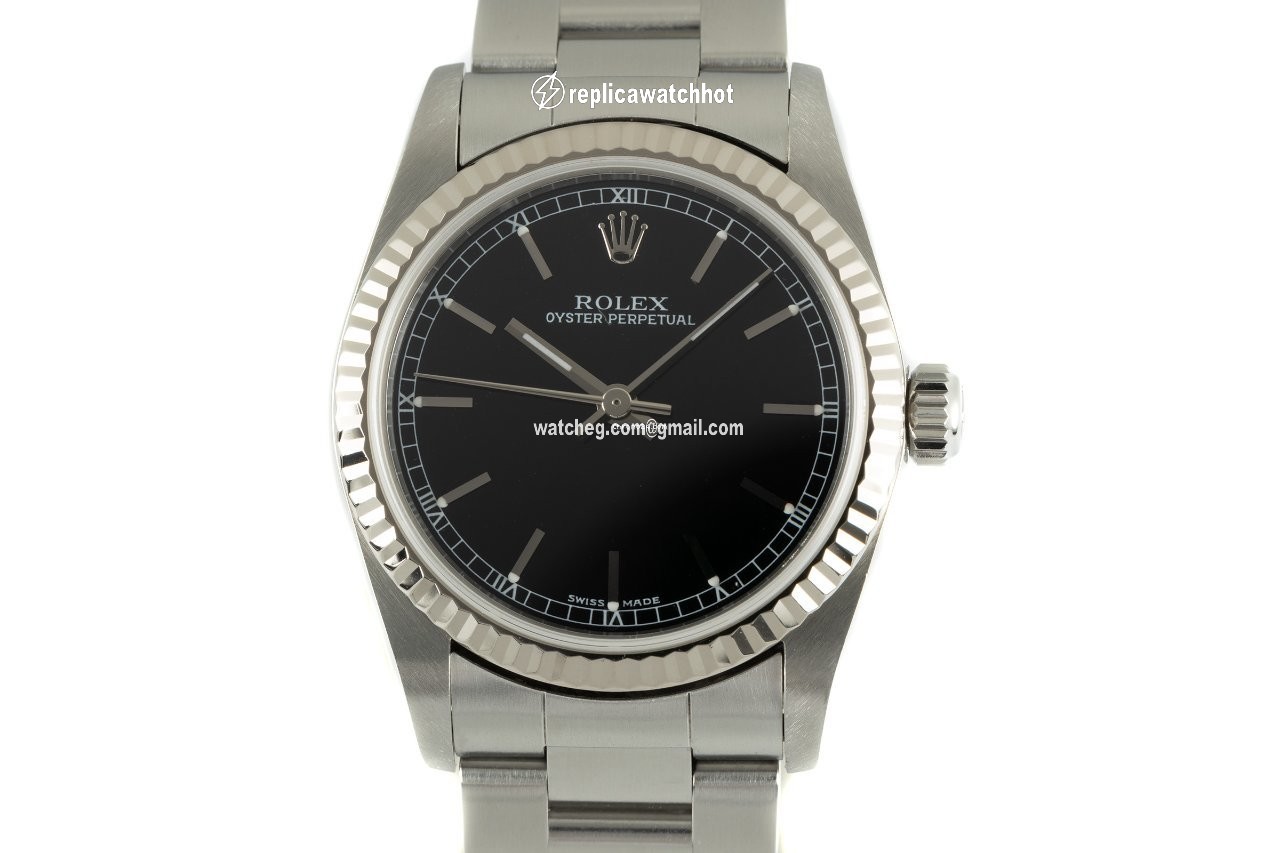 Rolex Oyster Perpetual 31 Womens watch Gold Steel Automatic 77014