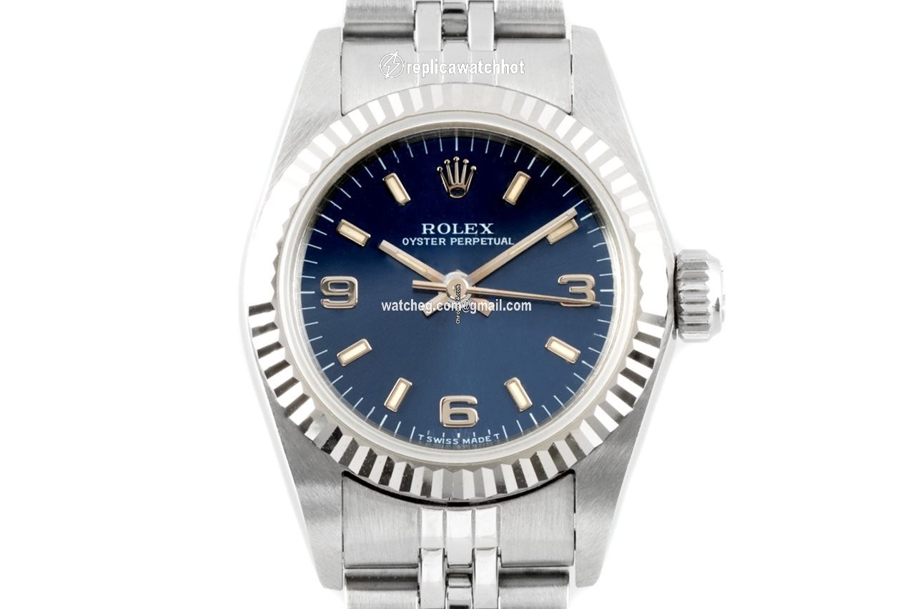 Rolex Oyster Perpetual Womens watch Gold Steel Automatic 67194