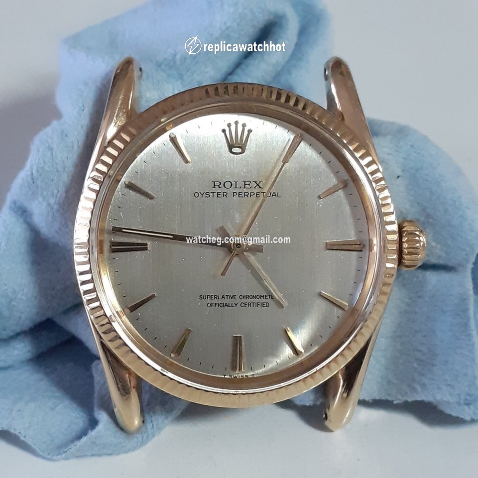 Rolex Oyster Perpetual 34 Mens watch Unisex Yellow gold Automatic 1011