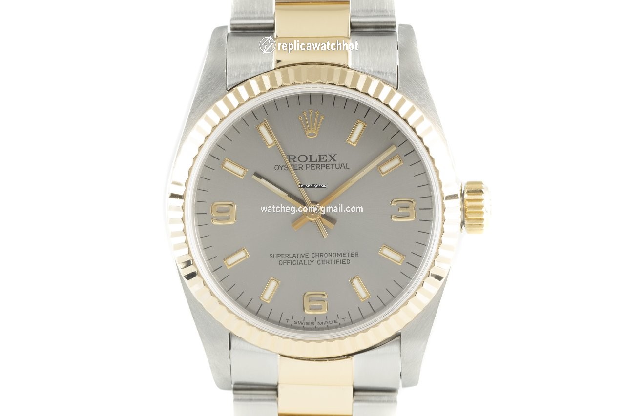 Rolex Oyster Perpetual 31 Womens watch Gold Steel Automatic 67513