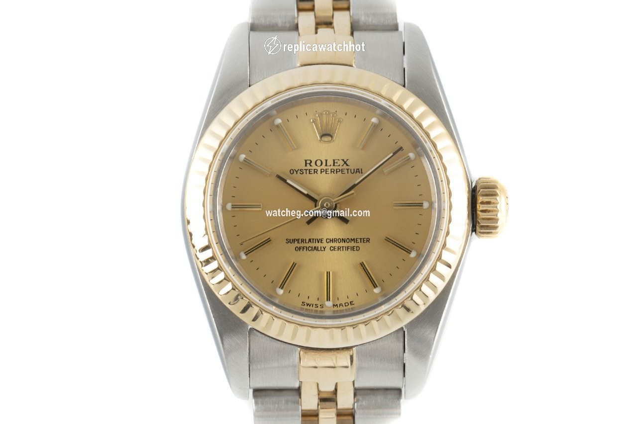 Rolex Oyster Perpetual Womens watch Gold Steel Automatic 67193