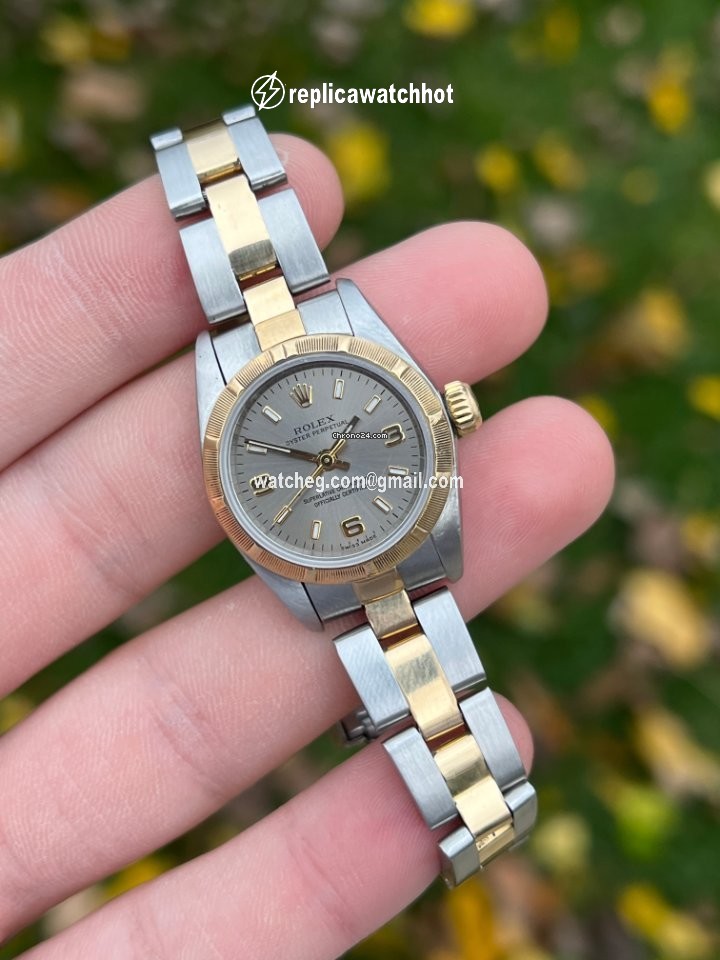 Rolex Oyster Perpetual Womens watch Gold Steel Automatic 76243