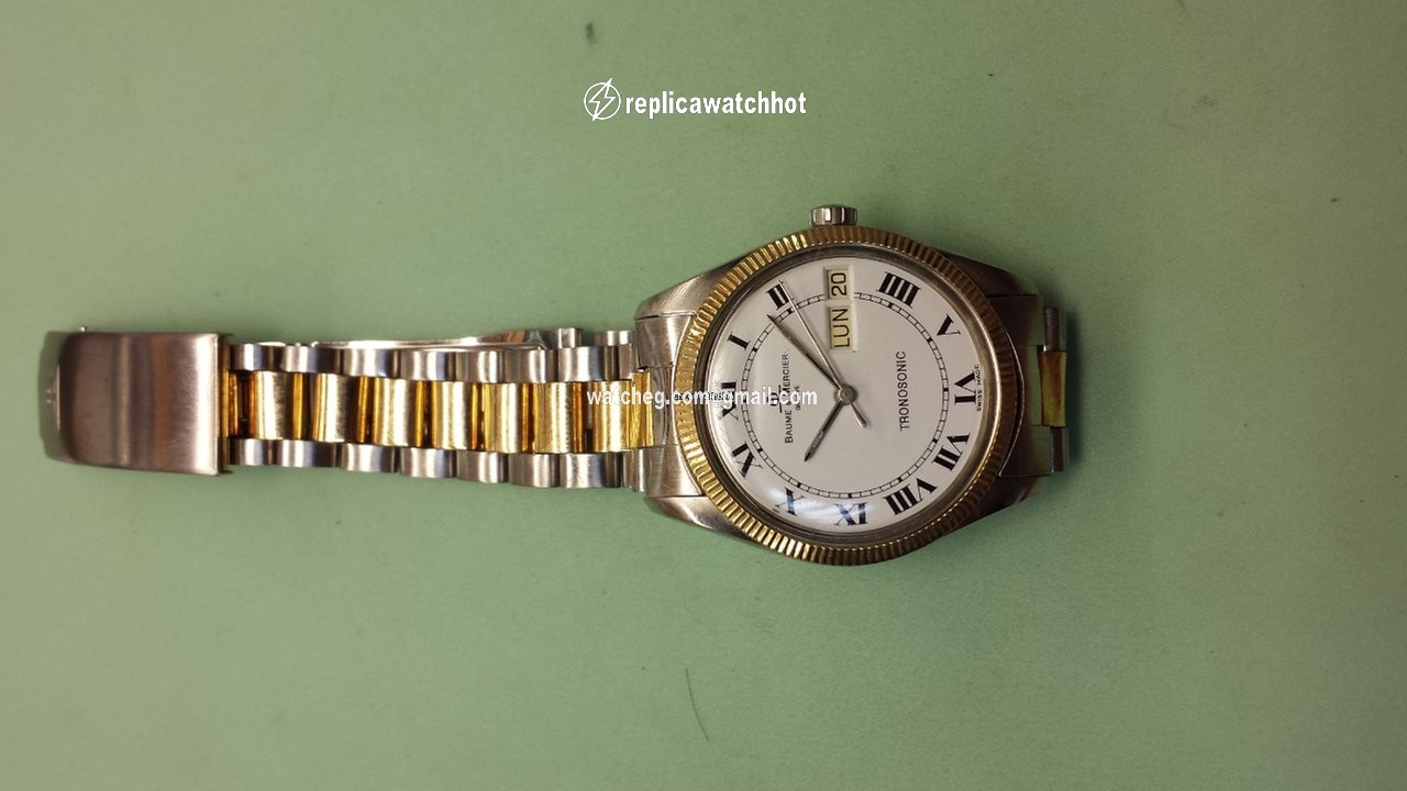 Baume & Mercier Mens watch Unisex Quartz Gold Steel 5101