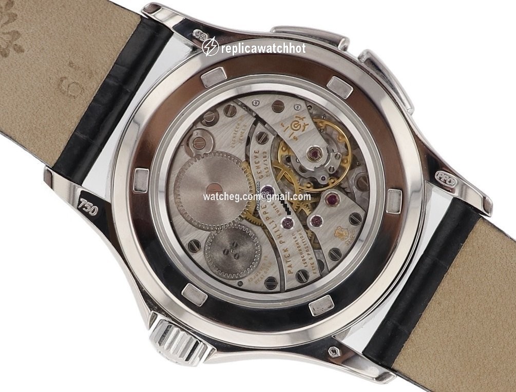 Patek Philippe Travel Time Mens watch Unisex Manual winding White gold 4934g-001 2