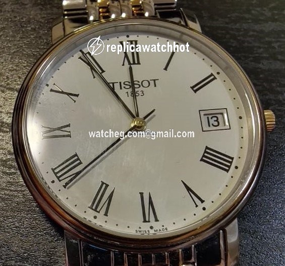 Tissot Mens watch Unisex Quartz Gold Steel T870 970 2