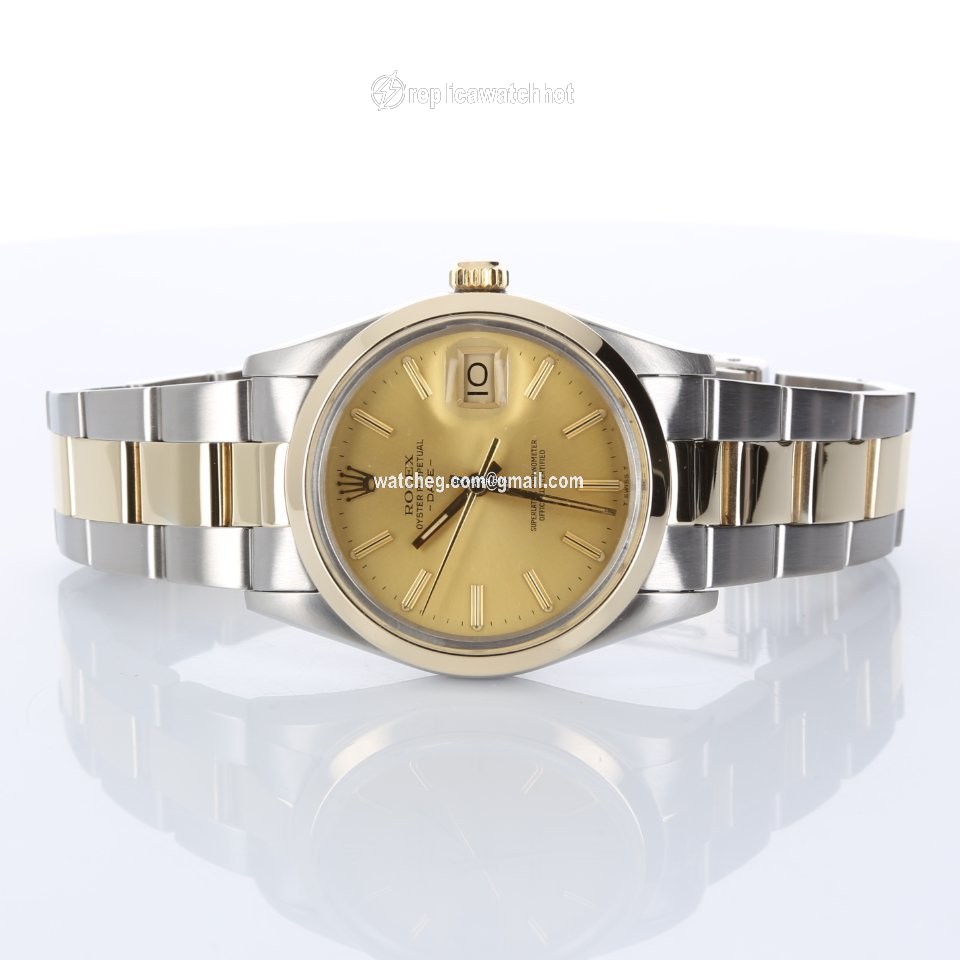 Rolex Oyster Perpetual Date Gold Steel 15003 2