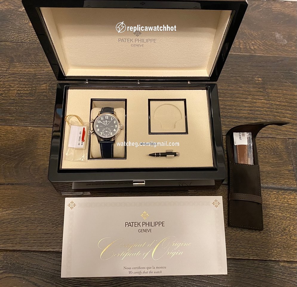 Patek Philippe Travel Time Mens watch Unisex Automatic White gold 7234G-001 2