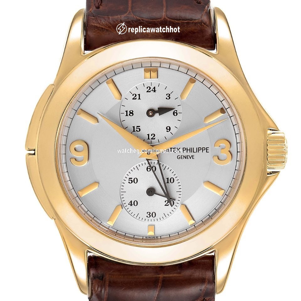 Patek Philippe Travel Time Mens watch Unisex Manual winding Yellow gold 5134J 2