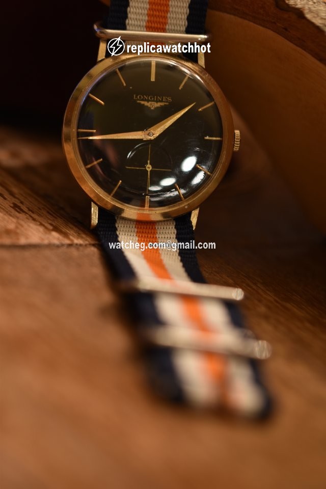 Longines Conquest Heritage Mens watch Unisex Automatic Yellow gold L1.611.6 2