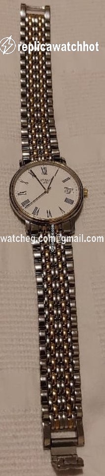 Tissot Mens watch Unisex Quartz Gold Steel T870 970 2