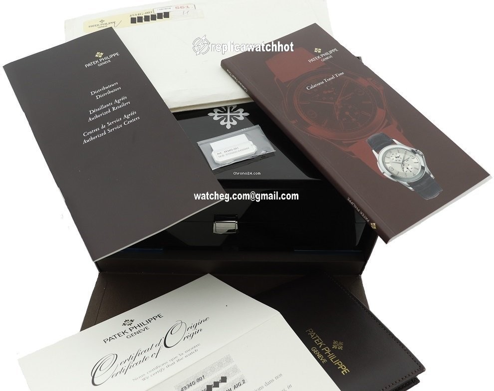 Patek Philippe Travel Time Mens watch Unisex Manual winding White gold 4934g-001 4