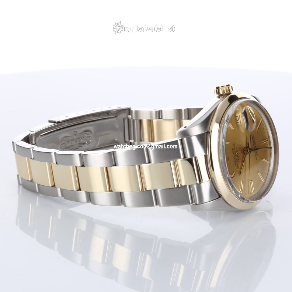 Rolex Oyster Perpetual Date Gold Steel 15003 4