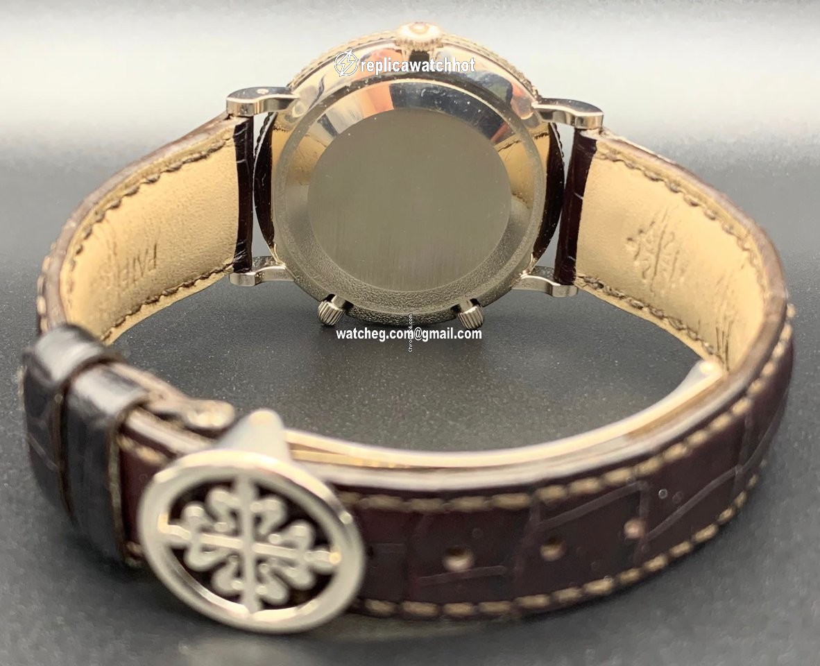 Patek Philippe Travel Time Mens watch Unisex Manual winding White gold 5034G 4