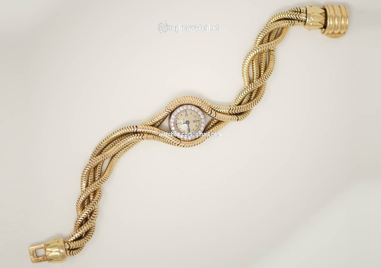 Cartier Womens watch Manual winding Yellow gold RARE 1940S DIAMOND SET PLATINUM, 18KT YG TRIPLE TWIST WATCH 4