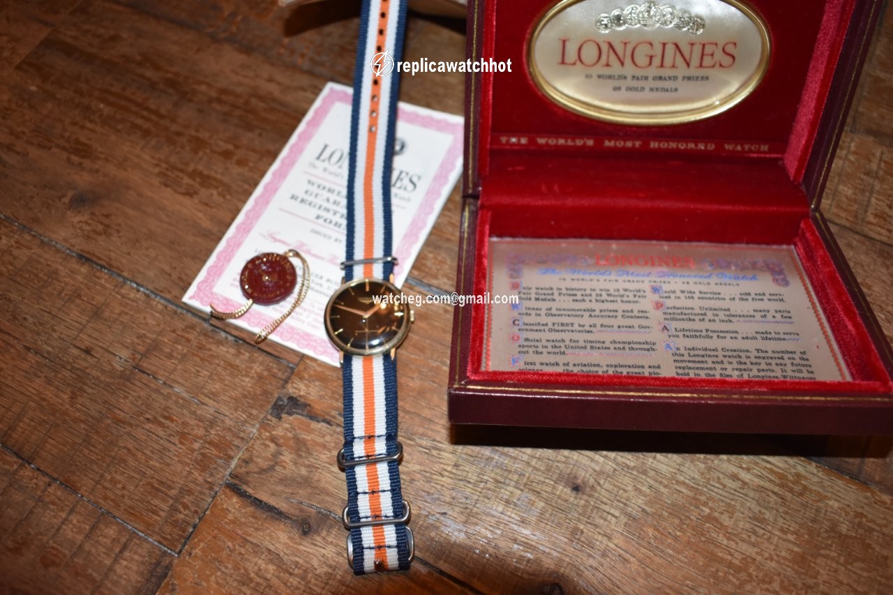Longines Conquest Heritage Mens watch Unisex Automatic Yellow gold L1.611.6 5