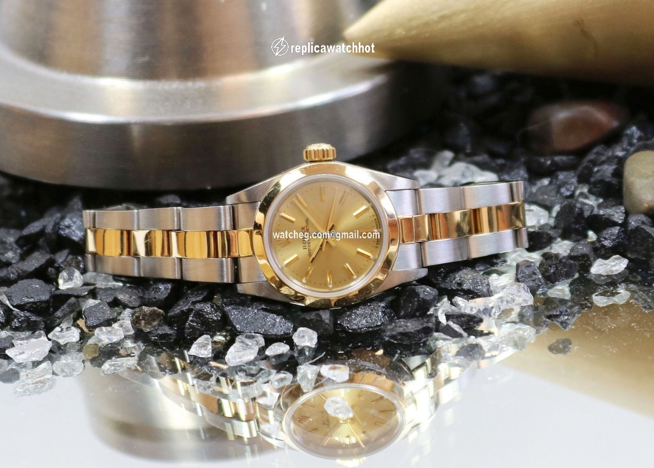 Rolex Oyster Perpetual Womens watch Gold Steel Automatic 67183 5