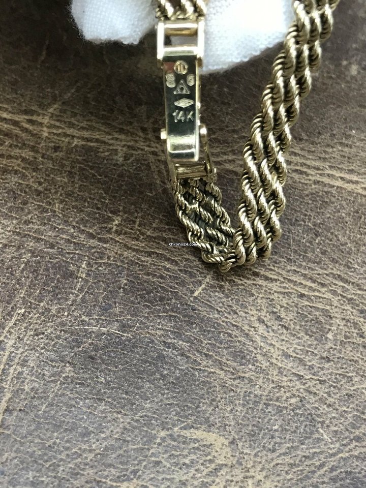 Omega Quartz Yellow gold 14K 7