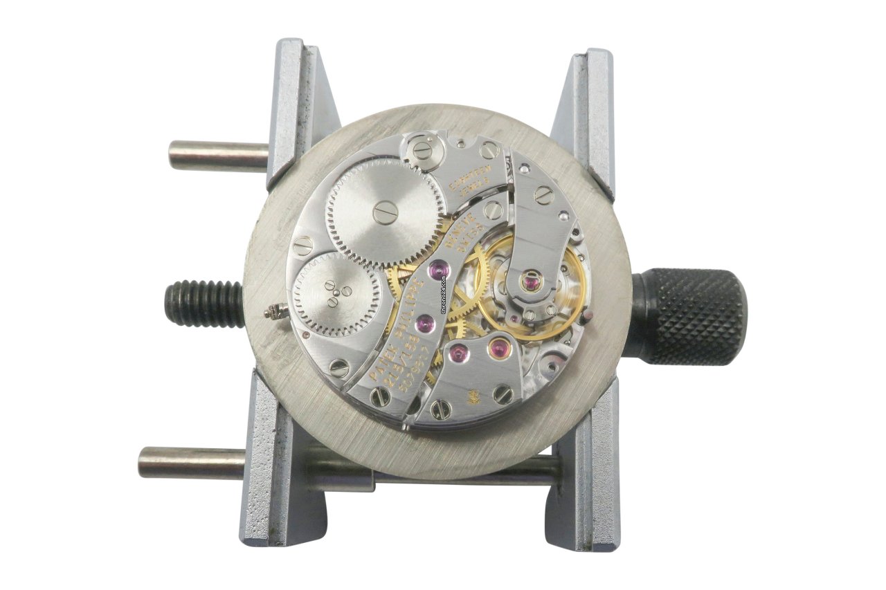 Patek Philippe Travel Time Mens watch Unisex Manual winding Yellow gold 5034 7