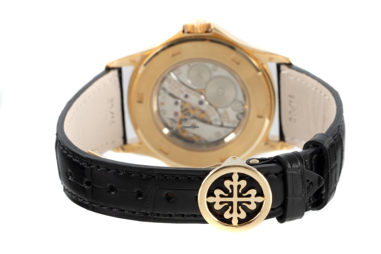 Patek Philippe Travel Time Mens watch Unisex Manual winding Yellow gold 5134 7